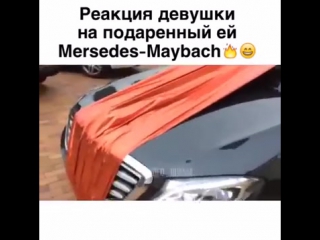 the reaction of the girl to the presented to her - mercedes-maybach))